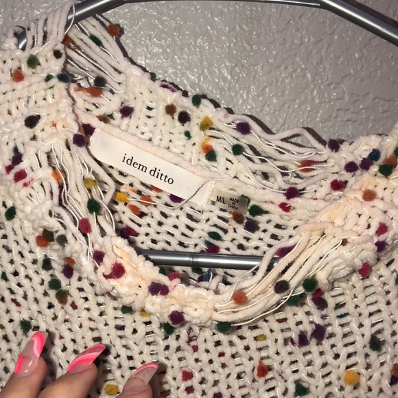 A cute colorful sweater with  a distressed bottom - Picture 4 of 6